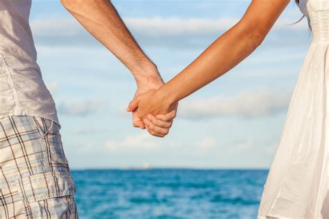 couple holding hands real images|woman and man holding hands.